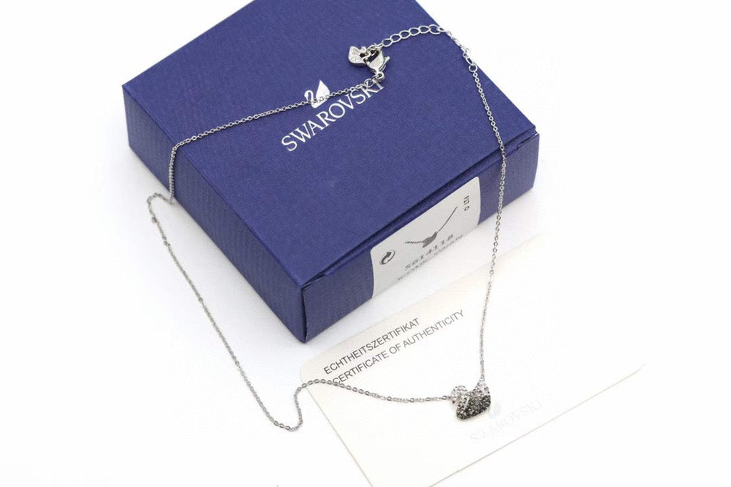 Swarovski Swan Pendant Necklace in Gold-Tone – Black Detail